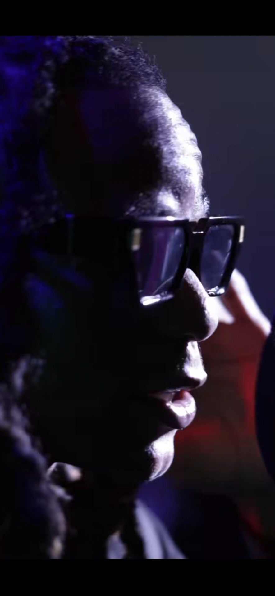 Close-up cinematic portrait of KG